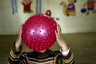 L'autisme infantile précoce touche environ 270 enfants par an en Suisse (archives). KEYSTONE/AP CHINATOPIX